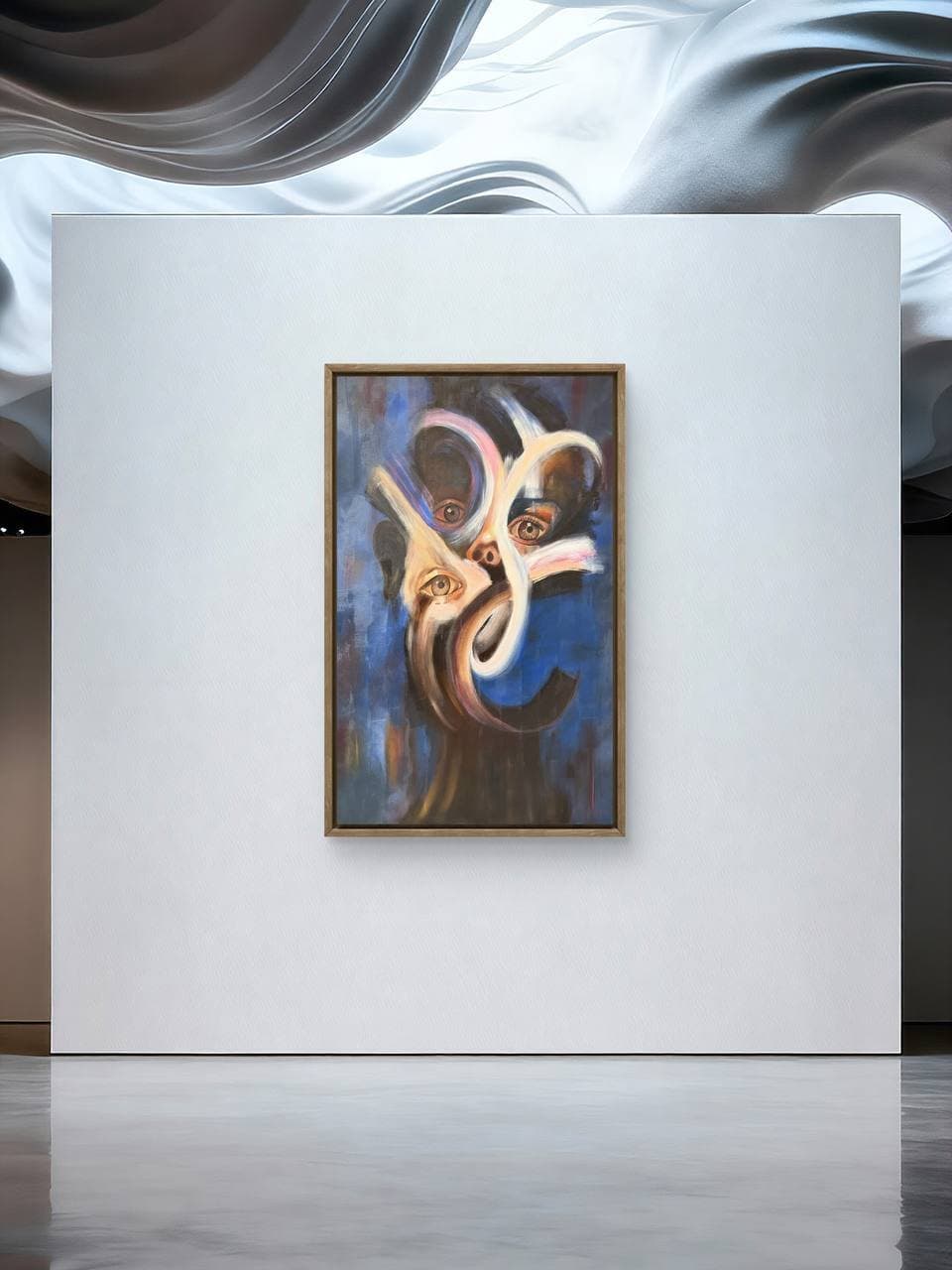 A room view: Four Ways of Seeing on a wall, with the ceiling and the floor in frame.